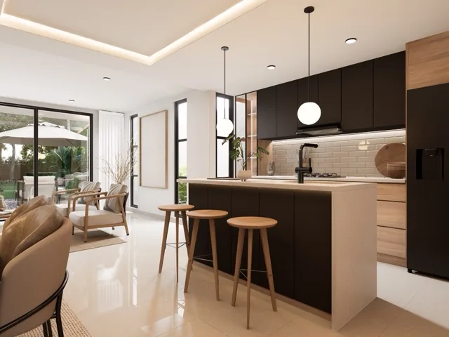 Cocina abierta con materiales nobles
